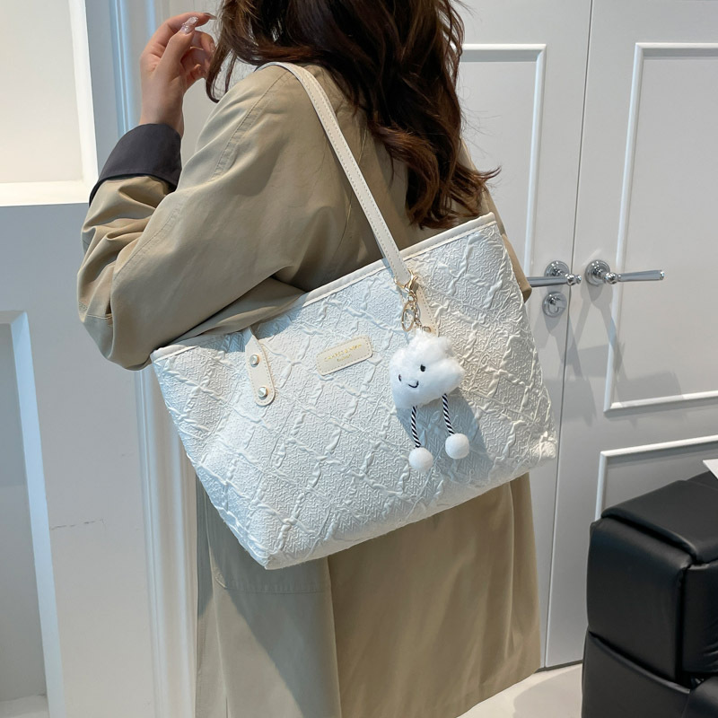 Tendencia transfronteriza coreana bolso de mano bolso de mujer 2025, nuevo otoño bolso de hombro de aire extranjero a rejilla bolso de brazo de viaje