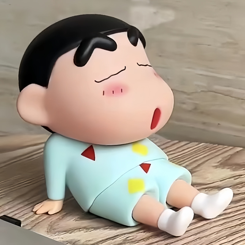 しんちゃんのアニメ怠け者の携帯電話のスタンドのデスクトップの置物|undefined