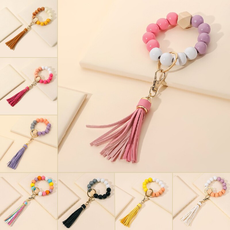 Amazon hot selling tassel wooden beads imitation silicone beads bracelet keychain female bracelet car bag pendant key ring