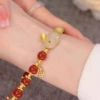 Красные бусины, браслет с кроликом