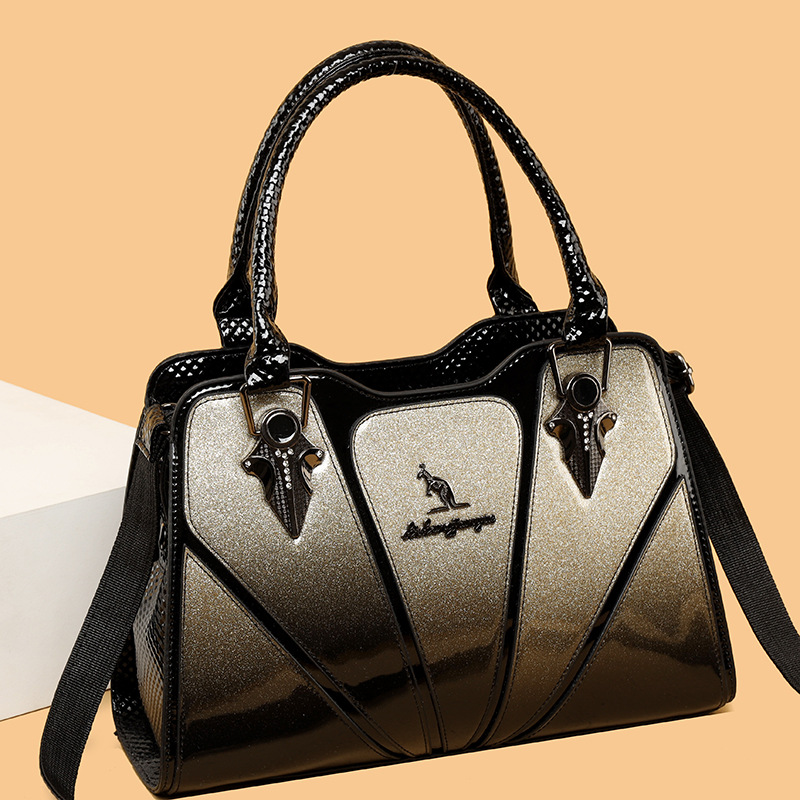 Cross-border 2024 nuevo estilo europeo y americano de alto nivel atmósfera bolsas de mano de mujer lacadas empalmadas bolsas de hombro de mujer