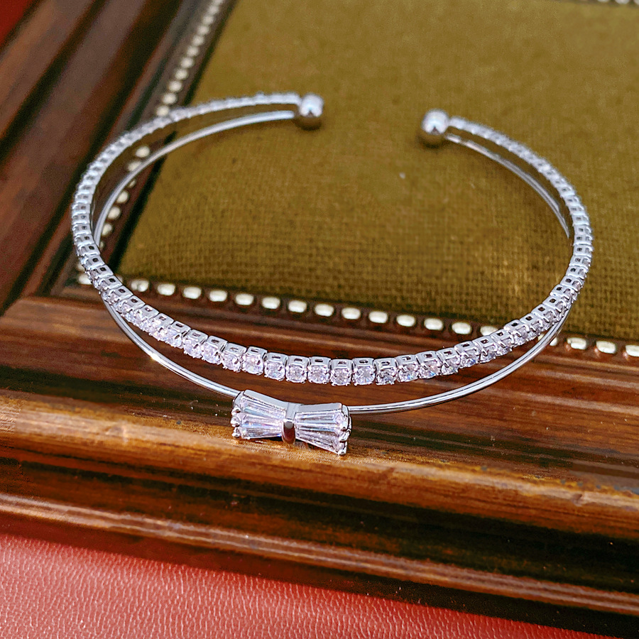 Doble arco de zircon brazalete abierto de moda diaria pulsera versátil ligera de lujo nicho alta sensación de joyas al por mayor