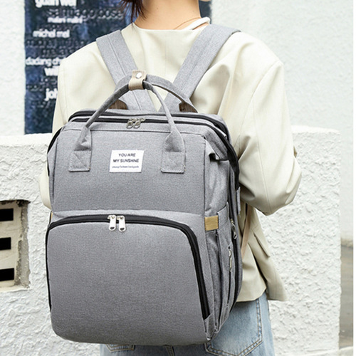 Factory wholesale mommy bag portable folding backpack mommy bag multifunctional hangable stroller crib mother and baby bag