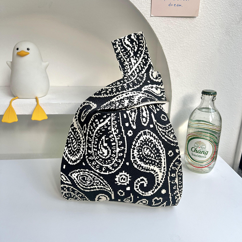 Bolso de punto de flores versión coreana del bolso de hombro de diseño de nicho de moda ins