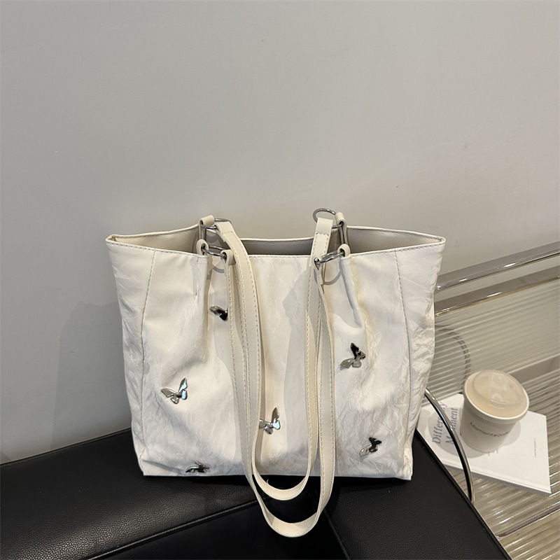 Bolso de viaje popular de gran capacidad de este año 2024 nuevo arco de moda bolso de hombro de mujer bolso universal