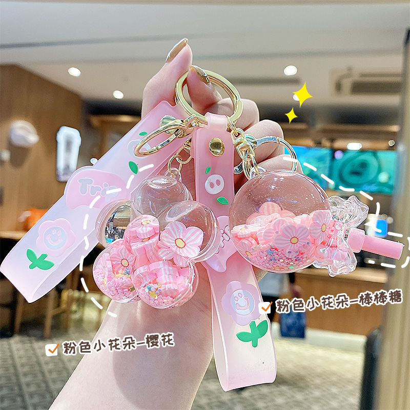 Crystal quicksand pendant pink flower oil floating car keychain girl schoolbag pendant holiday gifts