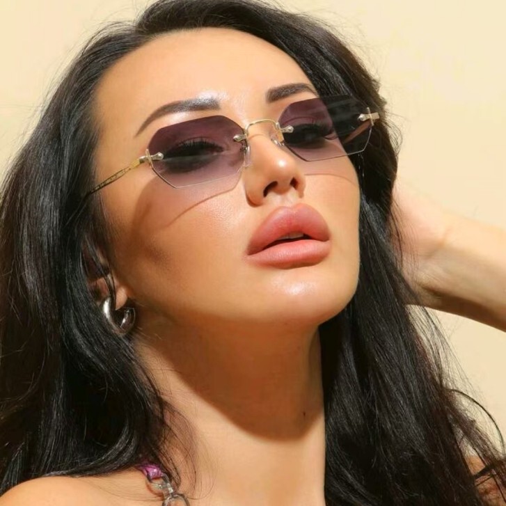2023 new European and American fashion rimless sunglasses International Station hot polygonal trim glasses fashion 83510