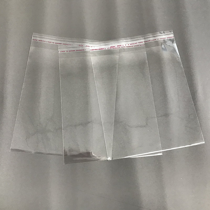 En stock venta al por mayor bolsa de OPP camisa de ropa bolsa de embalaje bolsa de plástico transparente Ziplock impresión adhesiva bolsa autoadhesiva