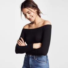 高弹力黑色一字肩长袖针织衫女2025秋季新款修身短款内搭打底上衣