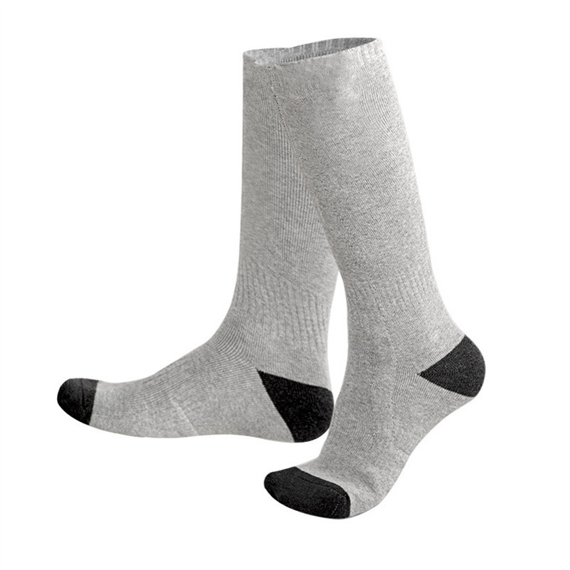 Calcetines de calefacción eléctricos transfronterizos Calcetines de calefacción de calentador de pies de hombres y mujeres Calcetines de calefacción de control de temperatura USB Calcetines térmicos de calefacción eléctrica en stock