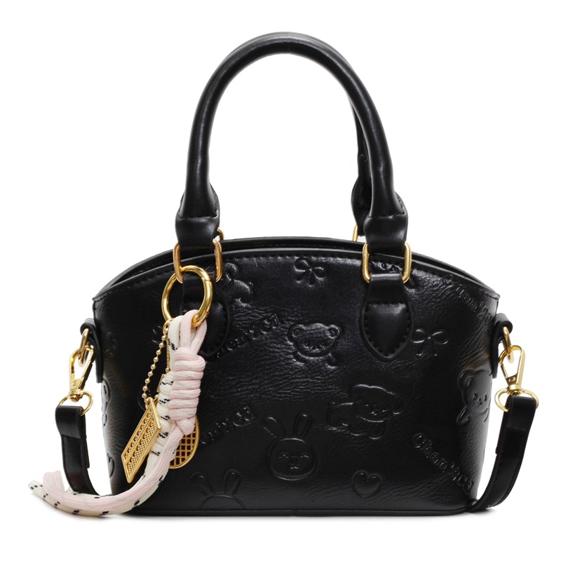 Tendencia nicho bolso de mano de moda mujer 2025 nueva textura versátil bolso de cubo bolso de transporte aéreo