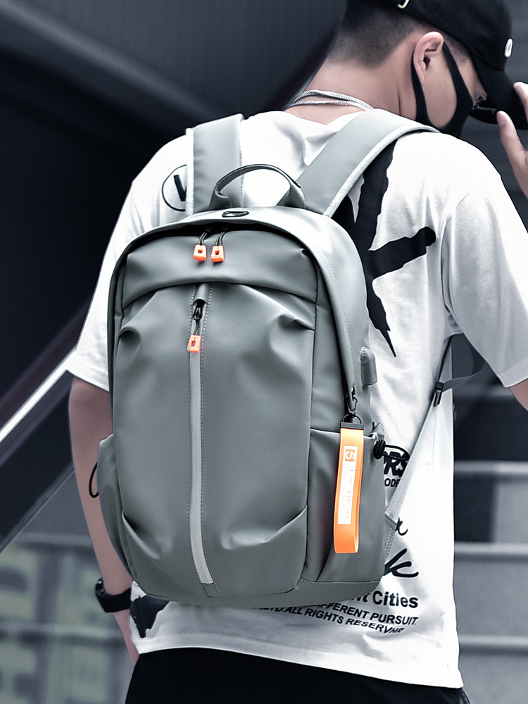 Mochila para hombre, ligera, de gran capacidad, bolso de viaje moderno para estudiantes universitarios, bolso informal de color sólido para computadora, venta al por mayor para hombres