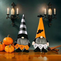 国境を越えたハロウィーンの新製品ルドルフが立っている人形の顔のない人形がプレゼントを飾っている小人鬼節パーティーの置物
