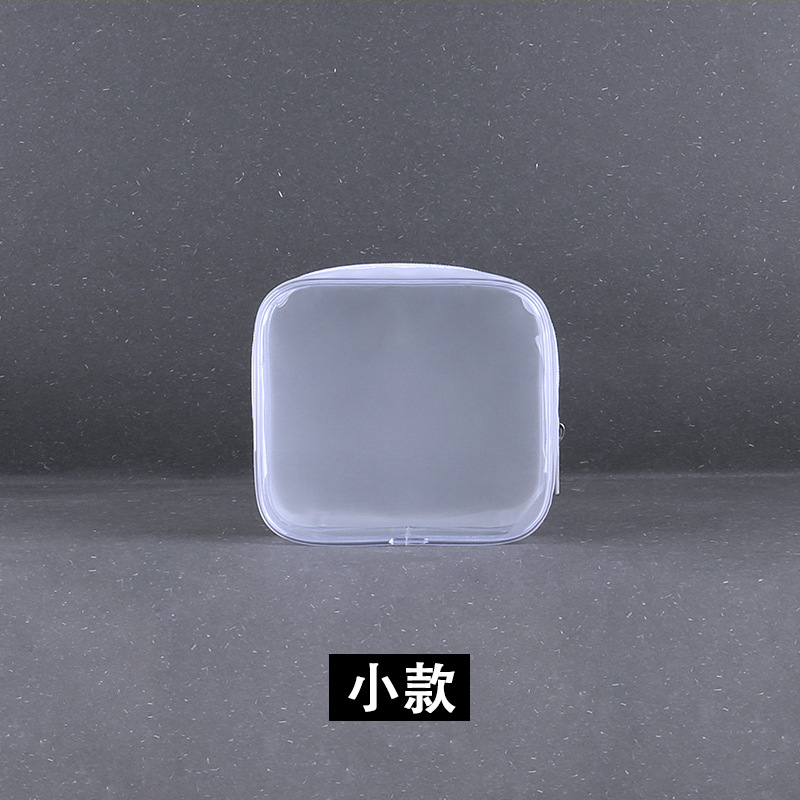 Bolsa de cosméticos de PVC bolsa de lavado tamaño pequeño transparente impermeable cremallera esmerilada bolsa de almacenamiento portátil de viaje conjunto de cuatro piezas al por mayor