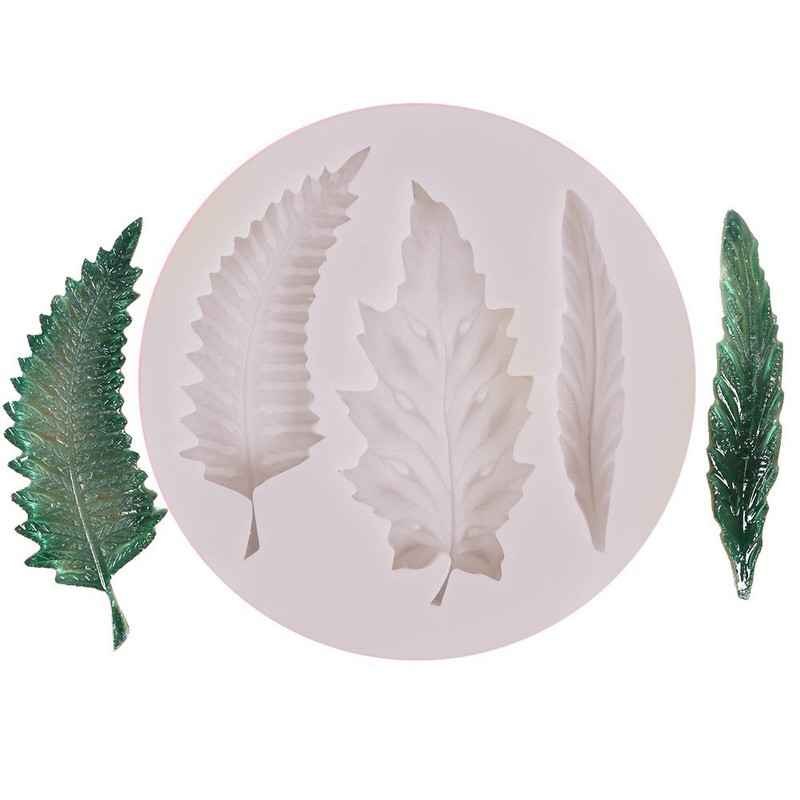 いくつかの草の葉のカエデの葉の形の液体のシリカゲルの鋳型のdiyはあめのケーキの石膏をひっくり返してゴムの鋳型を垂らします。|undefined