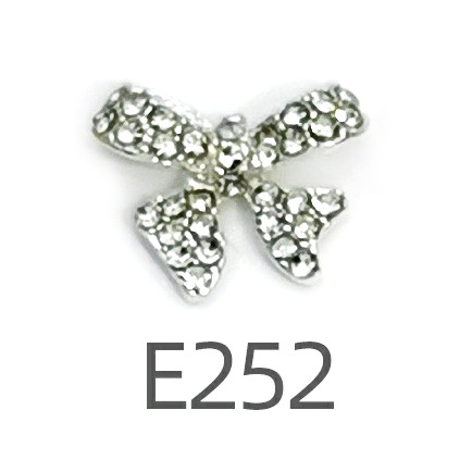 Transfronterizo Japonés arco de uñas accesorios de pajarita caliente simple todo fósforo tridimensional hueco joyería de uñas de diamantes al por mayor