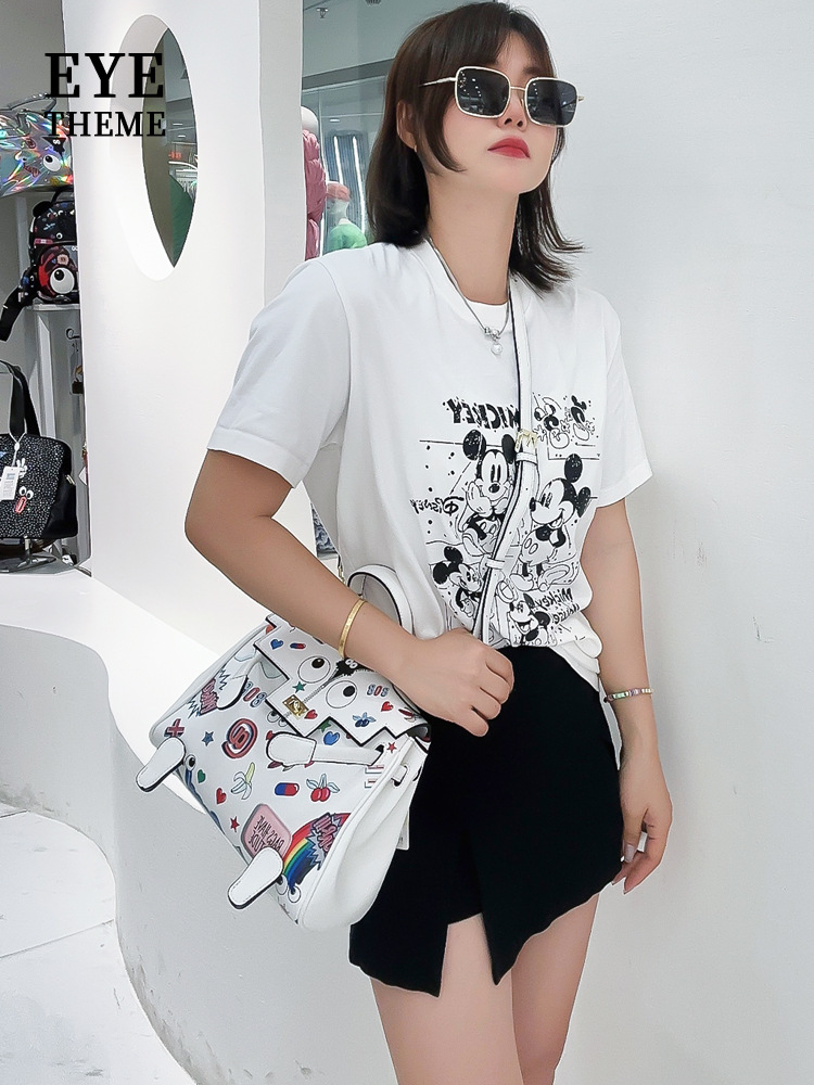 2024 primavera y verano en la nueva impresión de personalidad de la mujer extraña bolsos de mano de mujer con tapa de flip novedad encantadora inclinada mujer 2596 #