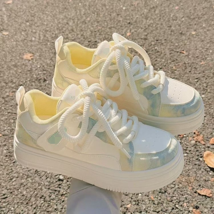 Zapatos blancos de suela gruesa para mujeres 2026 zapatos de skate de primavera y verano nuevos zapatos de pan casuales de estudiantes ligeros para mujeres