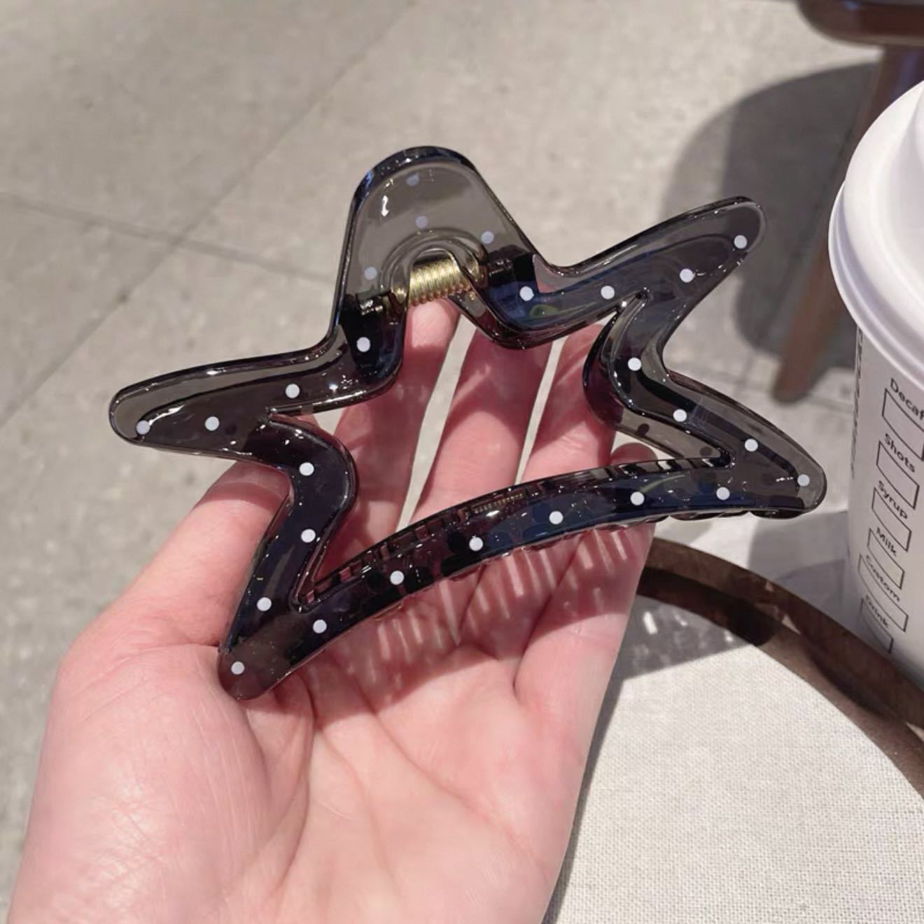Dark gray polka dot five-pointed star
