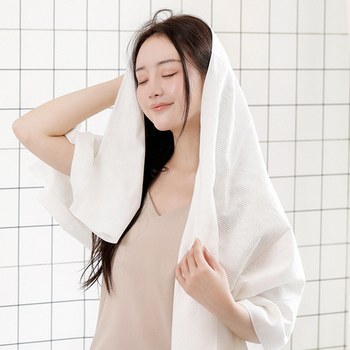Disposable bath towels beauty salon towels wholesale hotel sauna bath absorbent towels non-woven pearl pattern bath towels