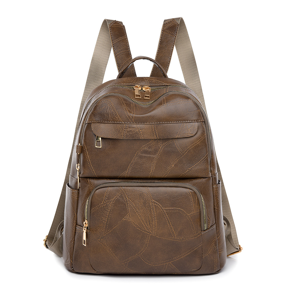 Nueva mochila casual de moda para mujer, mochila de gran capacidad simple de todo fósforo, viajes, viajes, viajes, bolsos de viaje al por mayor