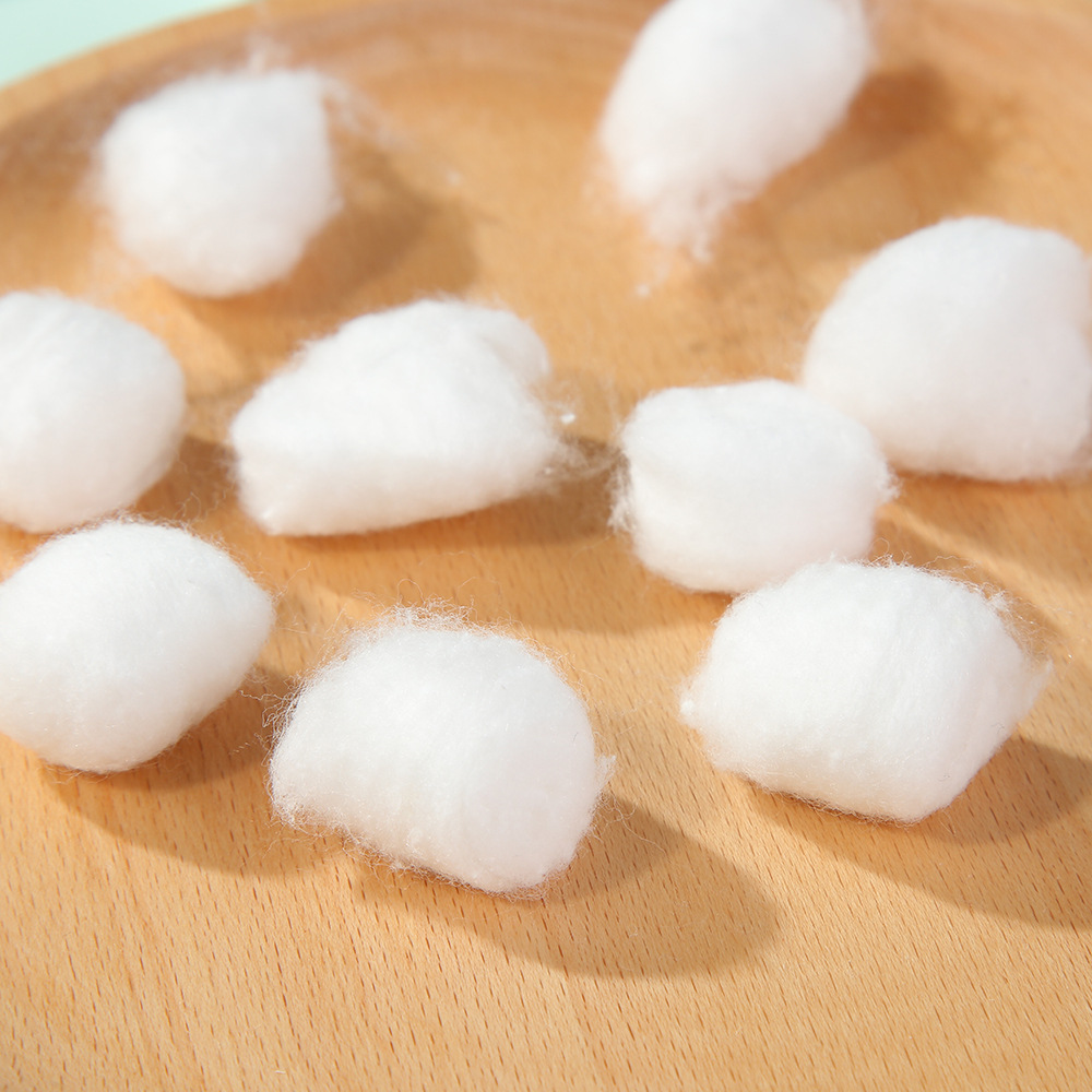 Cosméticos transfronterizos desengrasados bolas de algodón de color desechables pequeñas bolas de algodón de alcohol iodóide desmaquillaje al por mayor