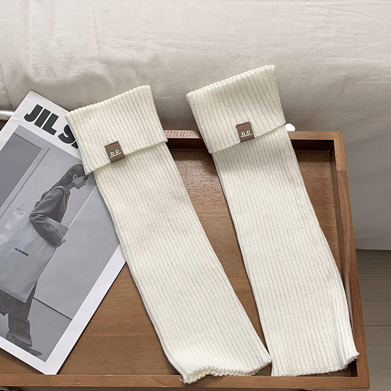 Piles de calcetines de viento de color sólido de otoño y invierno versátil engrosado anillo de calcetines engrosadas calcetines calientes no caen al por mayor