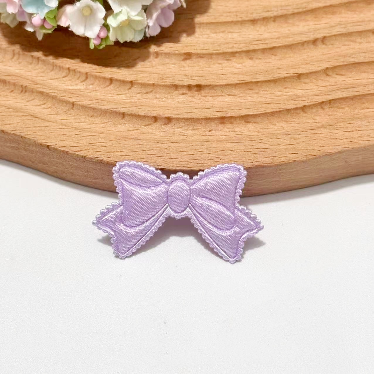 With bow, purple