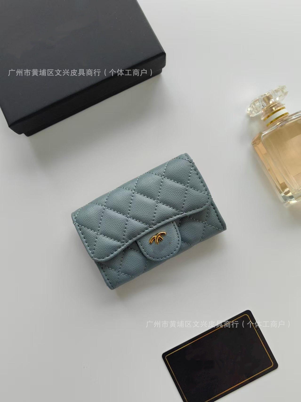 Cartera de cuero corta de diamante de alta calidad, nicho casual, gran capacidad, exquisita, pequeña bolsa de cambio de hebilla fragante.