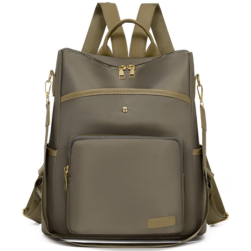 Mochila de tela Oxford nueva transfronteriza para mujer Mochila de moda estilo coreano retro mochila de viaje de moda con remaches simples