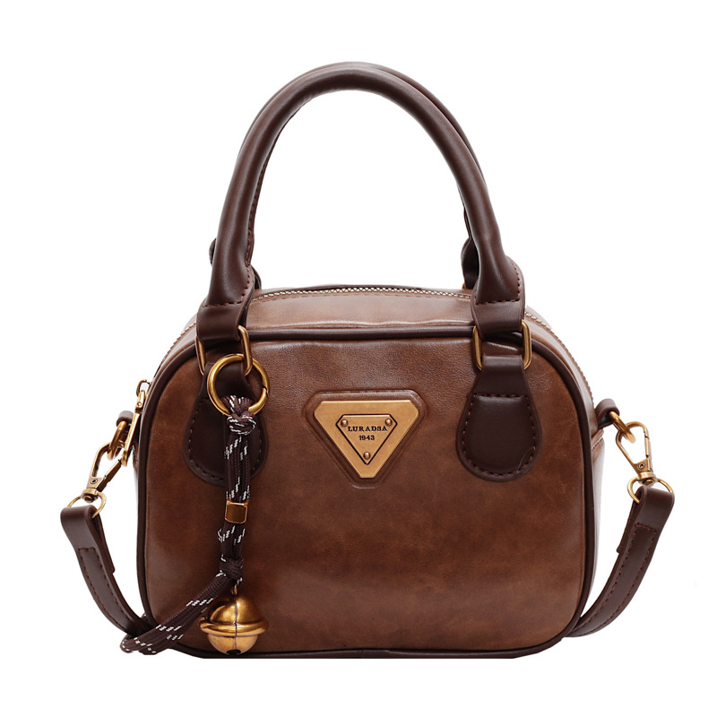 Diseño de nicho transfronterizo retro bolso pequeño para mujeres 2024 nueva moda de otoño y invierno simple bolso de hombro portátil