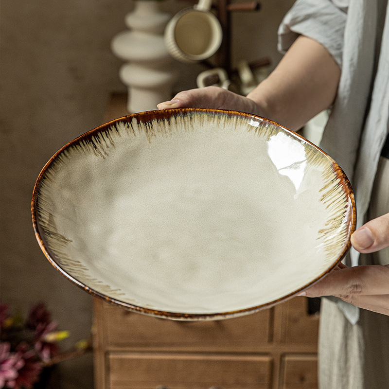 Plato de arroz de cerámica de alta apariencia irregular retro plato profundo de 9 pulgadas horno de exportación transfronteriza plato de platos