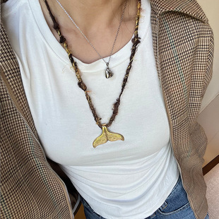 Niche design personality titanium steel fishtail long necklace cross-border Nepal imported silk handmade yarn sweater chain