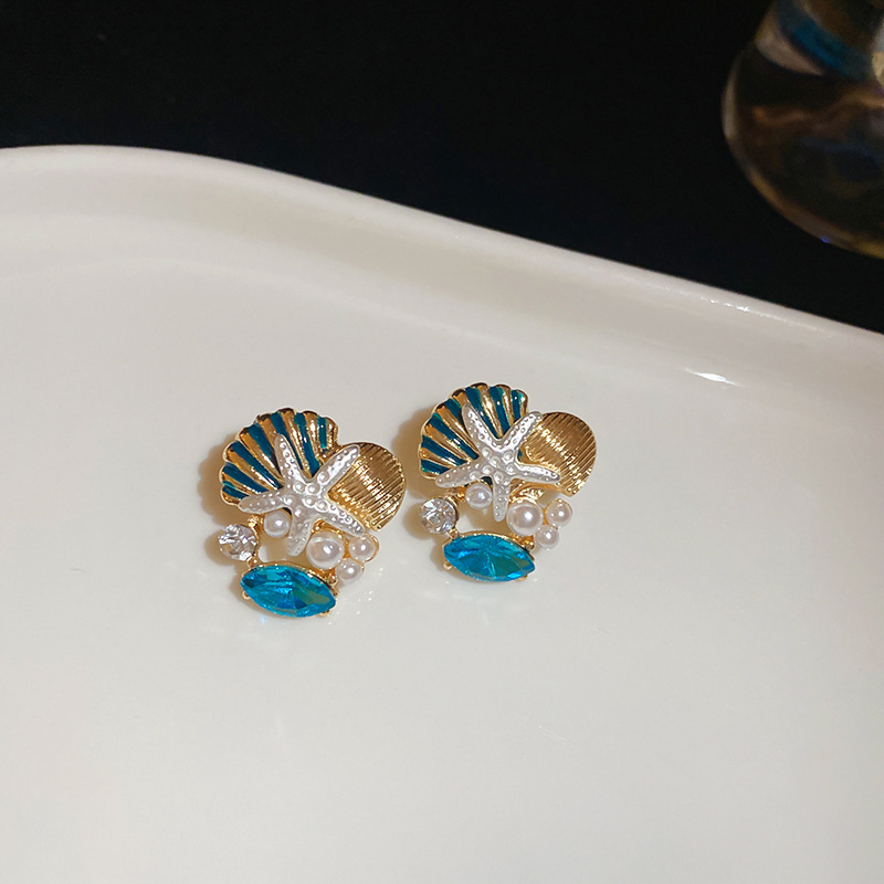 Collar de pendientes de coral de concha de estrella de mar goteando aceite, cadena de clavícula de todo fósforo de moda europea y americana, traje de nicho, lujo ligero, sentido de alta gama