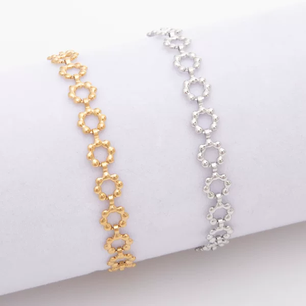 New plum blossom bracelet 18K gold vacuum plating personality titanium steel jewelry high sense left wheel magazine necklace waist chain