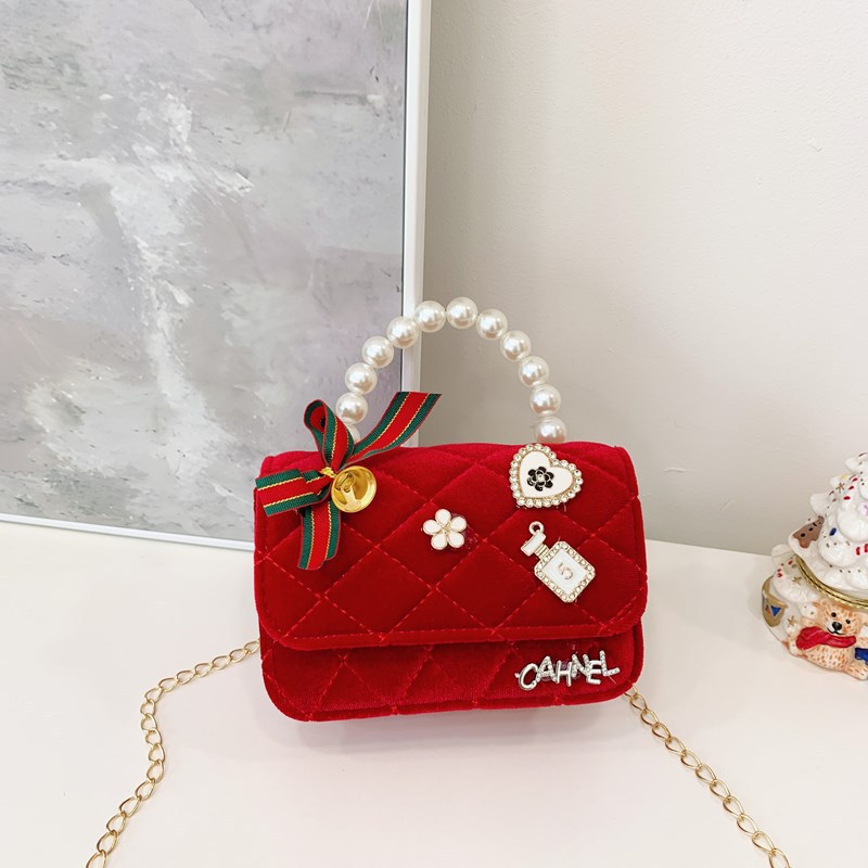 Bolso de niños nuevo bolso de perla rojo de Año Nuevo lindos princesas niñas bolso de hombro de cadena de estilo extranjero bolso de mochila