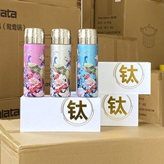 チタンコーティングされた魔法瓶カップ、中国風彫刻ビジネスギフトセット、チタンカップ、ポータブル茶水分離健康ティーカップ卸売