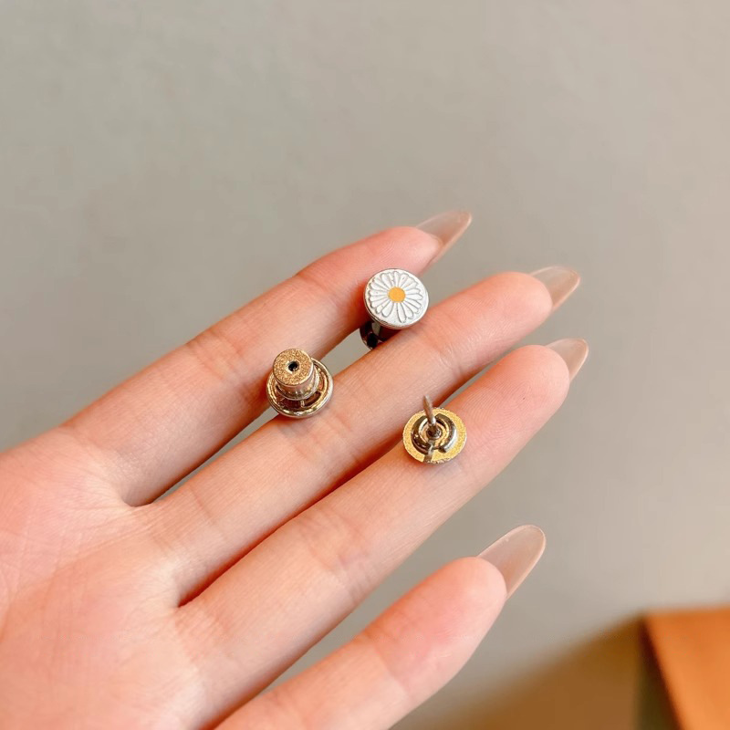 Botón de jeans sin costura ajustable y desmontable sin perforación para cambiar el tamaño de la cintura de los pantalones.