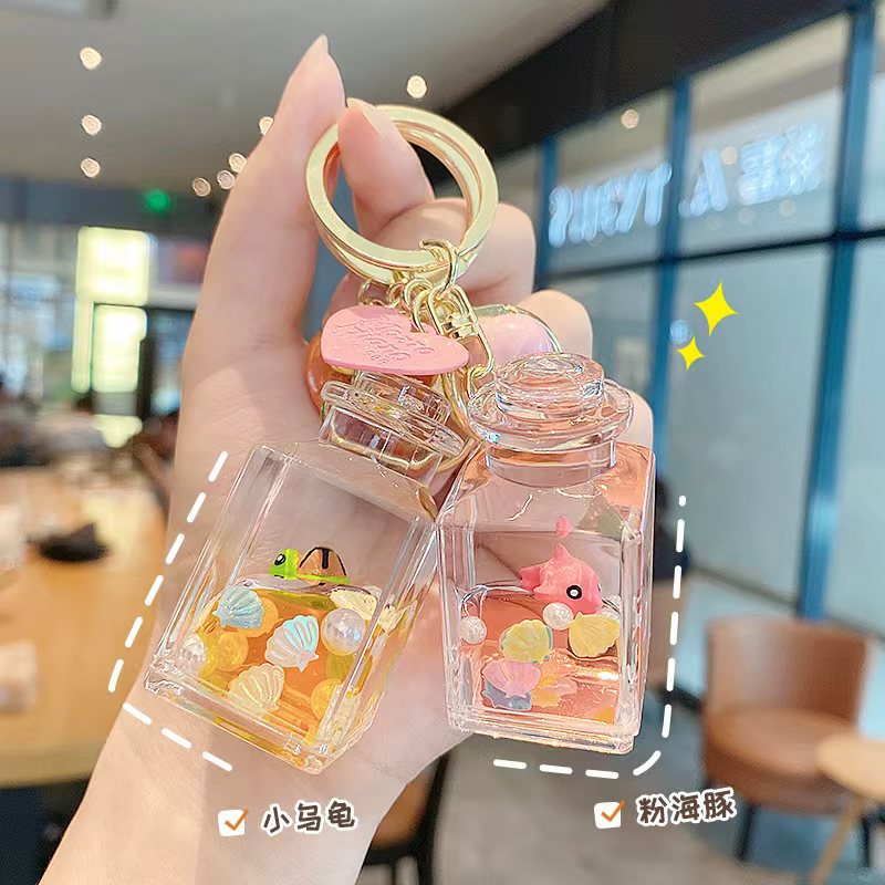 Flotante pequeño llavero de peces de colores para hombres y mujeres exquisito lindo botella a la deriva llave del coche colgante mochila colgante pequeño regalo