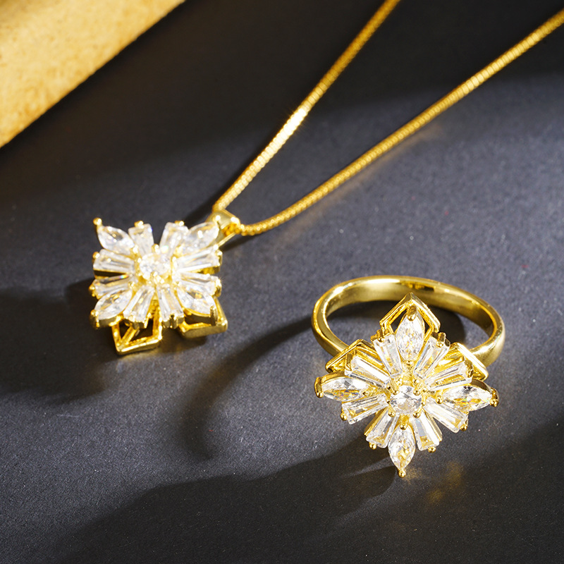 Nuevo oro de arena collar de flores de molino de viento geométrico mujer lujo ligero viento frío nicho joyería anillo fuente al por mayor