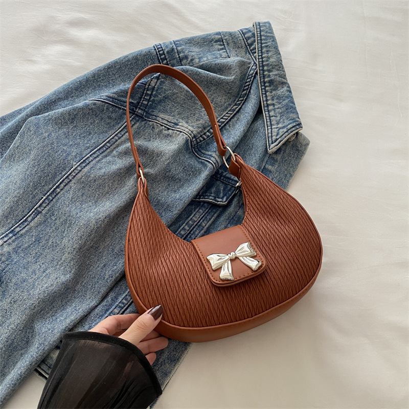 Bolsa debajo de la axila temperamento de alto valor facial bolso de mujer nicho de diseño bolso de hombro de invierno 2024 nuevo temperamento de arco mujer