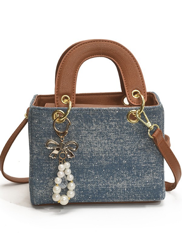 Diseño de nicho color en contraste bolso cuadrado pequeño portátil femenino 2025 nuevo bolso diagonal de diamantes retro de alta gama de moda