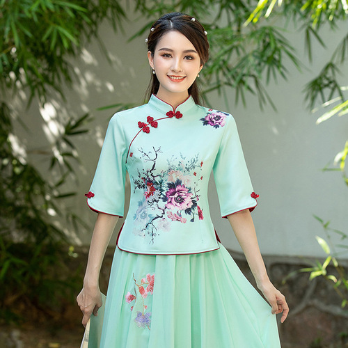 green emerald velvet dress The Huā Collection – Elegant Red Lace Cheongsam for Chinese New Year main image 1