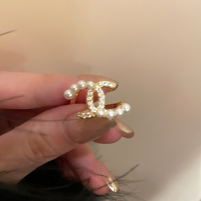 レトロな円形の緑松石の開口指輪の宮廷風の大衆の設計のファッション的な指輪の軽い贅沢な高級感の食指の指輪