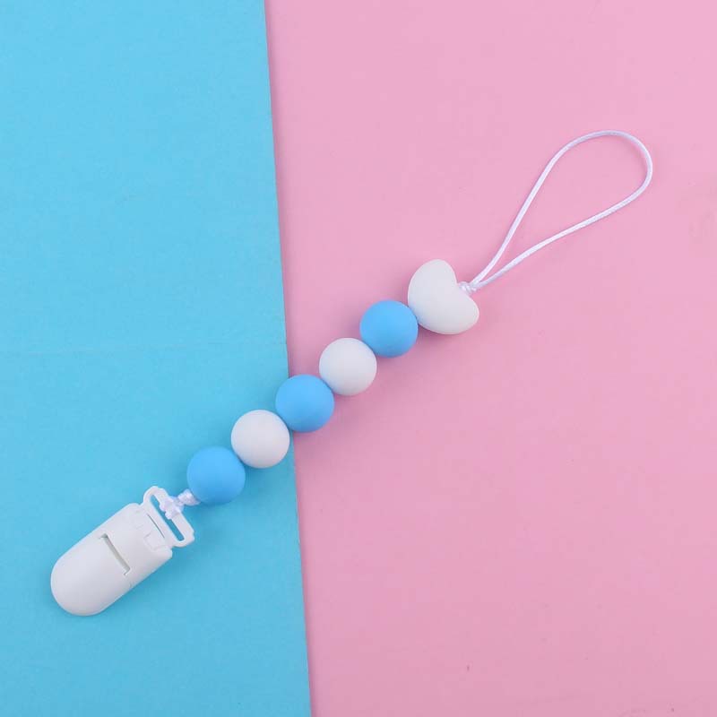 Nuevo bebé suministros de dibujos animados amor silicona DIY creativo macaron color serie mordedura cola molar pezón