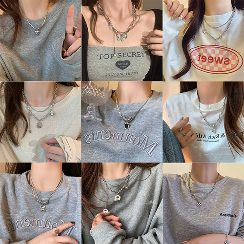 Ins style pearl necklace women's light luxury niche design high-end clavicle chain tassel love pendant jewelry wholesale