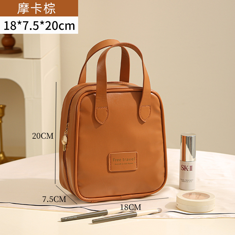 Nueva bolsa de maquillaje de viaje PU para mujeres productos de cuidado de la piel bolsa de maquillaje de almacenamiento de gran capacidad portátil bolsa de maquillaje portátil