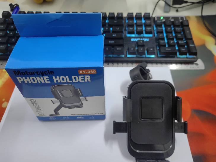 Cross-border motorcycle phone holder, vehicle-mounted delivery rider navigation stand, electric vehicle and bicycle shock-absorbing phone holder