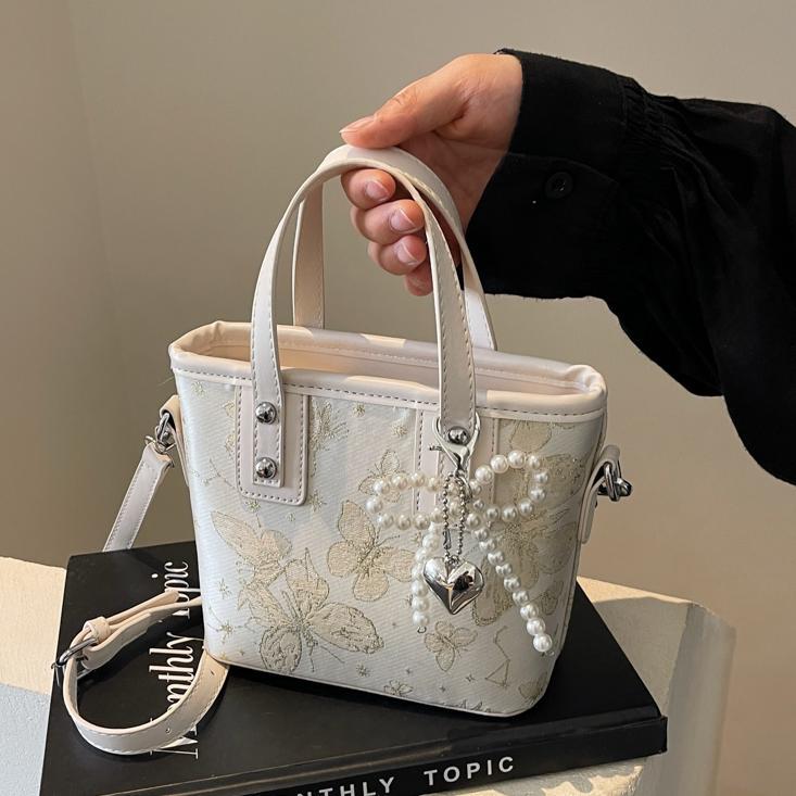 Bolsa de cubo de mano para mujeres 2025 nuevo estilo nacional popular bolso de hombro alta textura versátil bolso de moda moda