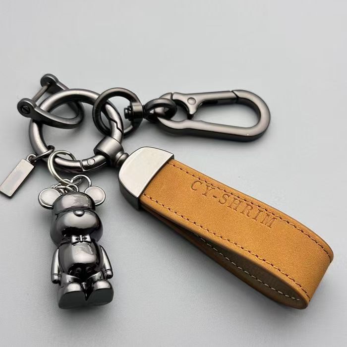 かわいいアニメの熊の暴力的な熊の金属のキーホルダーの男女の自動車のペンダントのキーホルダーの高級な革紐は掛けます。|undefined